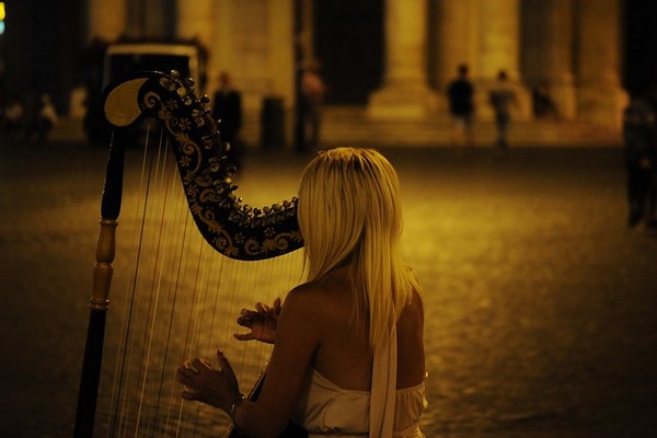 harp musician playing on the street