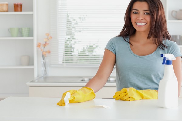 woman-cleaning-kitchen