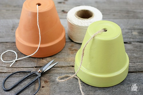 Turn a terra cotta pot into a string and/or twine dispenser! Great for your kitchen, potting bench or craft room! www.livelaughrowe.com