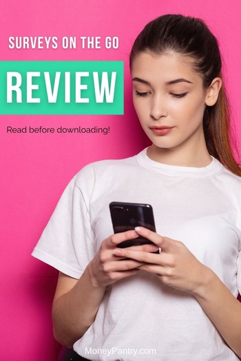 Making extra cash with the Surveys on the Go app. A woman earning money by taking a paid survey on her smartphone with the Surveys on the Go app.