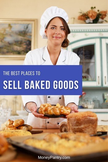 Woman smiling while displaying a tray of homemade baked goods on a kitchen table