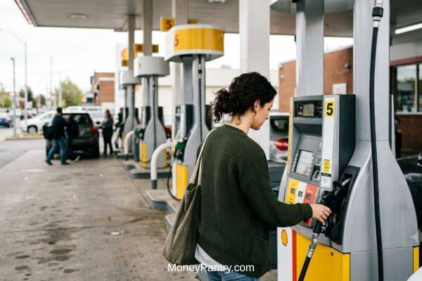 Secret shopper checking a gas pump price display during a gas station mystery shopping visit 